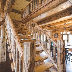 Rustic Half-Log Stairway to Loft 